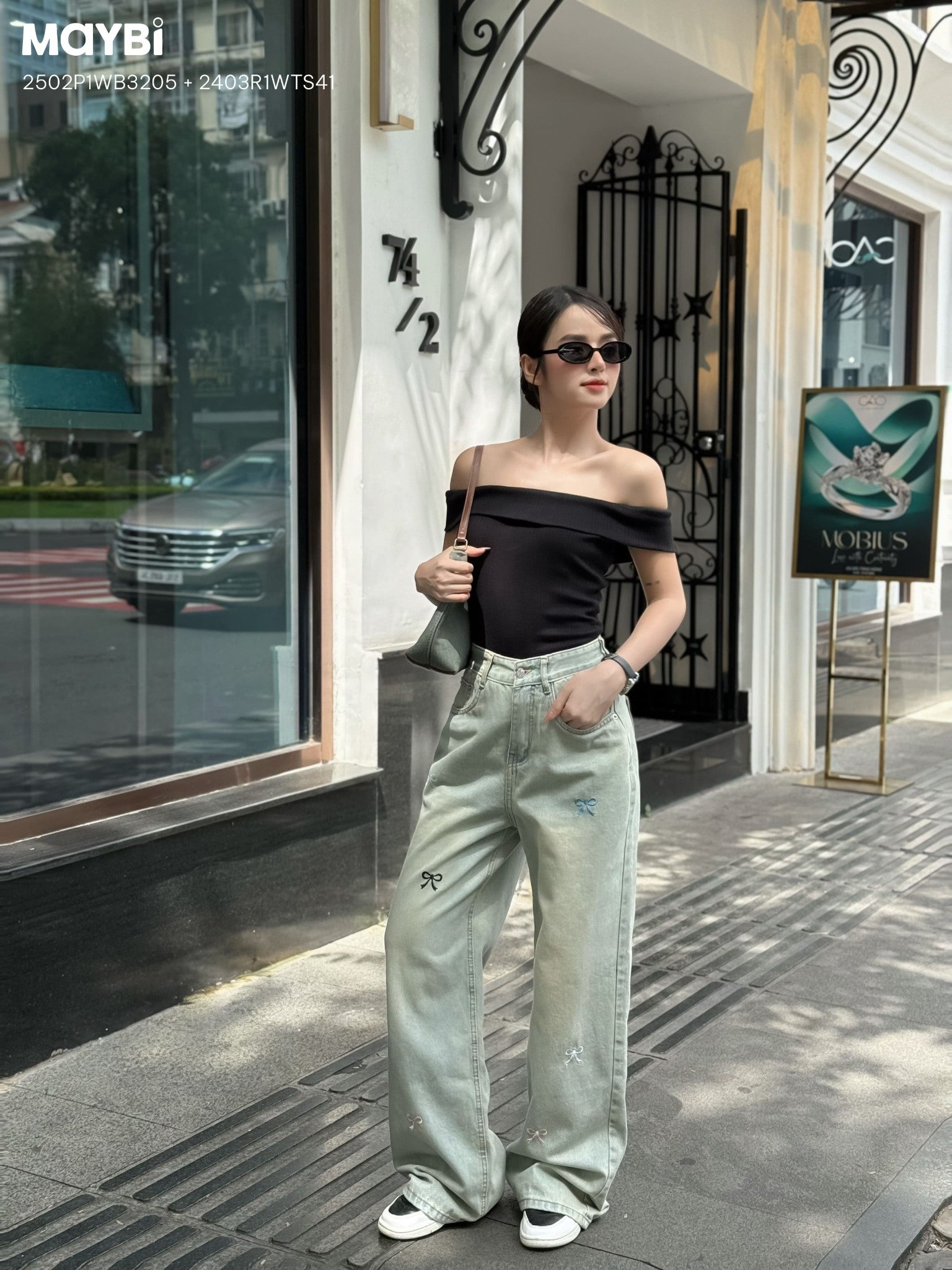 Quần jean ống suông phối nơ trang trí