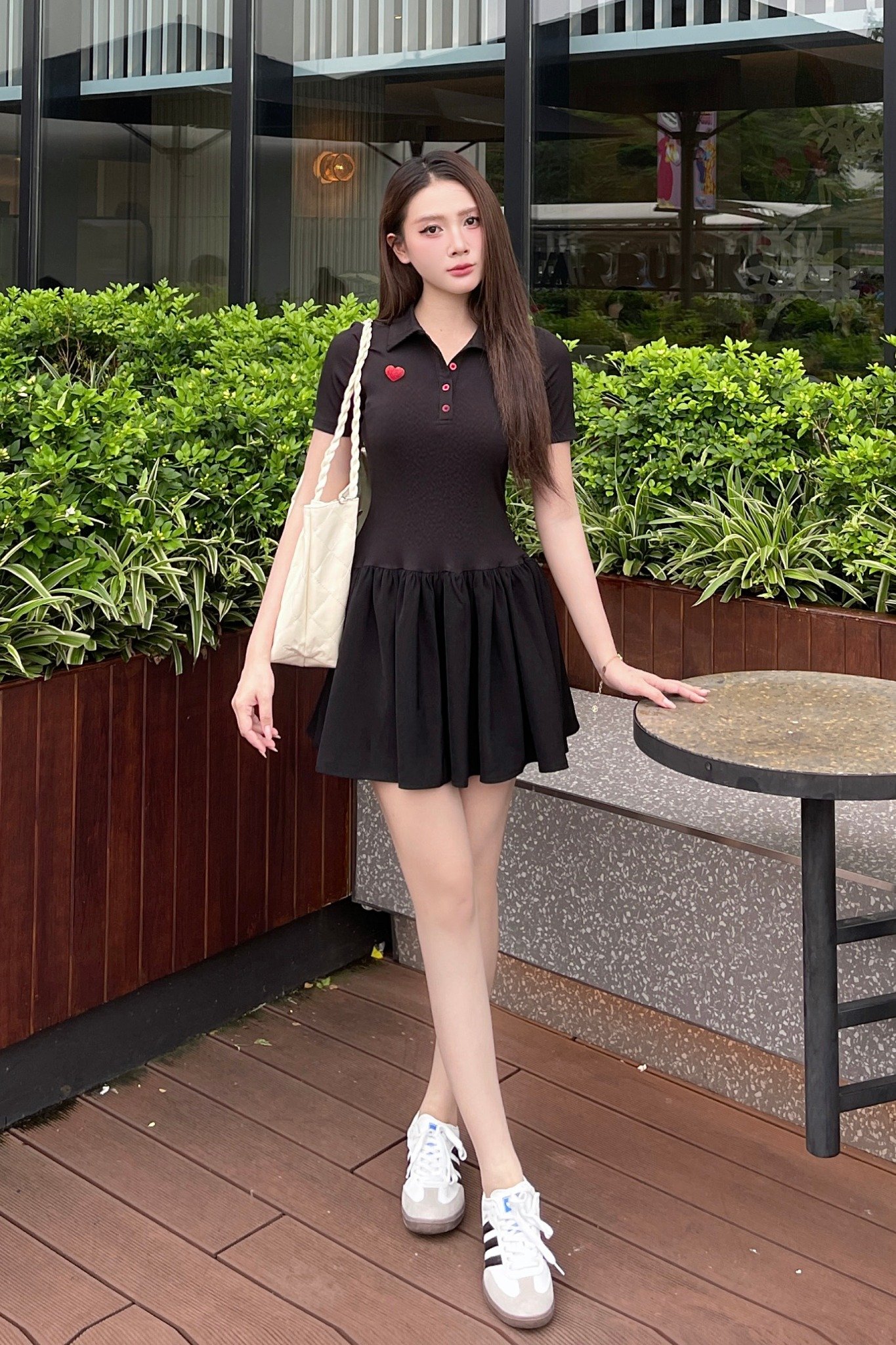 Đầm polo thun đen tùng nhún xòe dáng mini