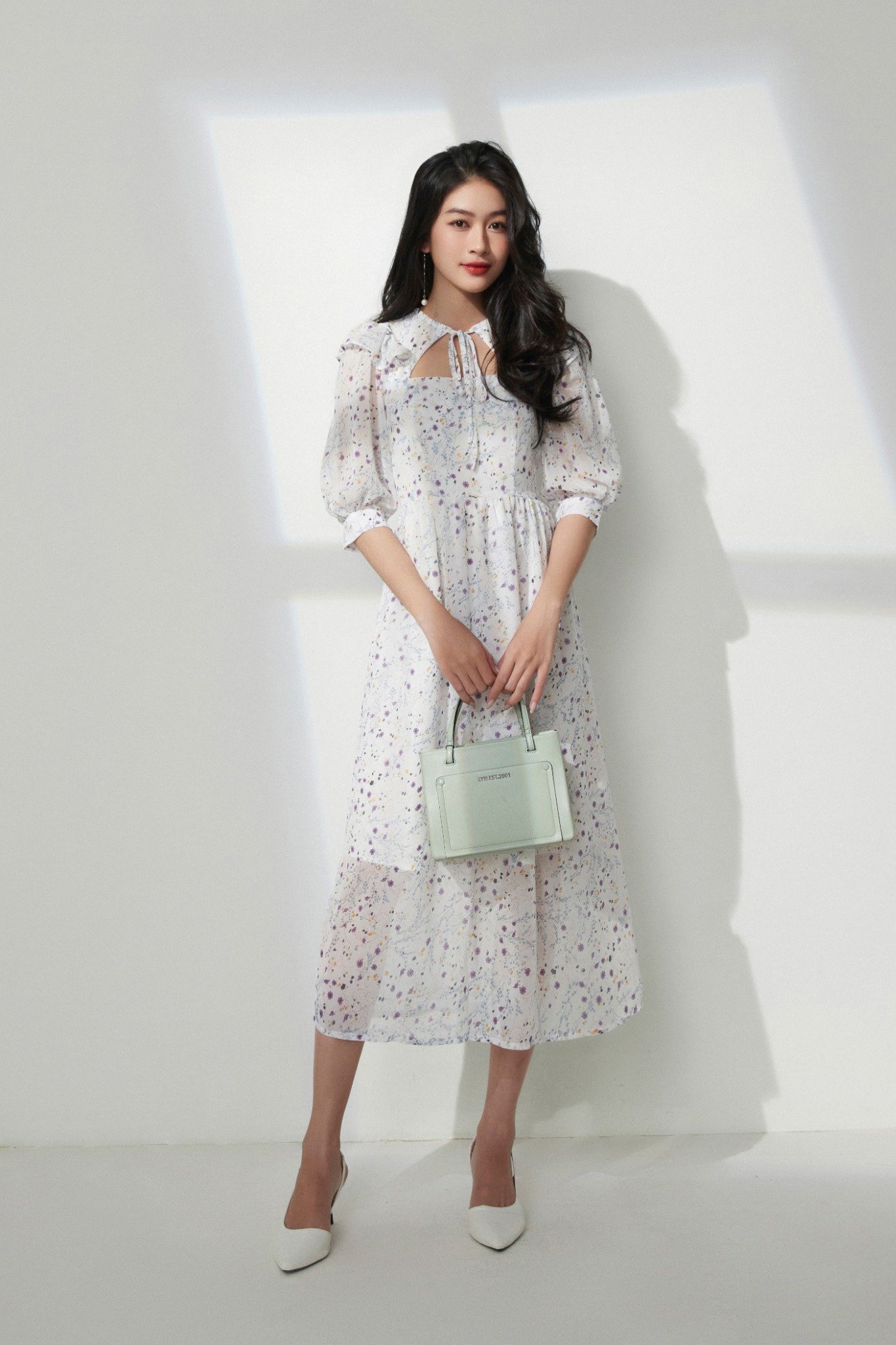 Đầm phối nơ tay bồng