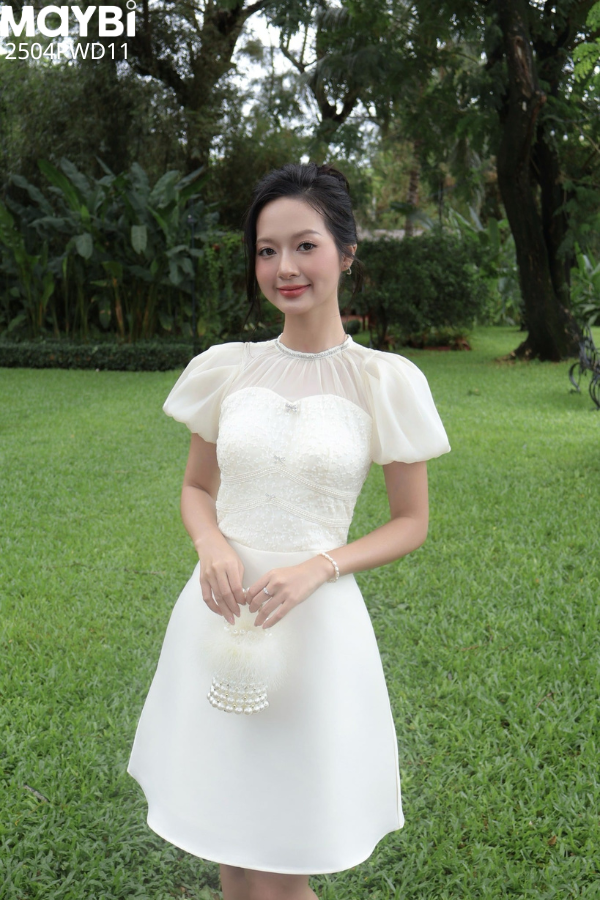 Đầm xòe tafta phối voan kem tay bí dáng midi
