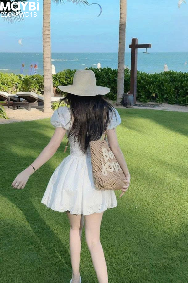 Đầm ôm tùng nhún xòe cotton thêu tay bí dáng mini