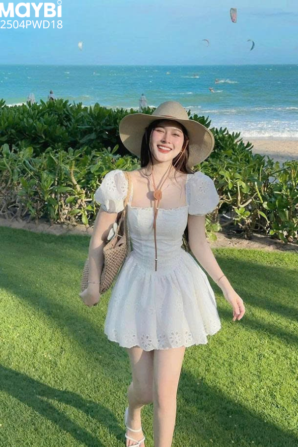 Đầm ôm tùng nhún xòe cotton thêu tay bí dáng mini