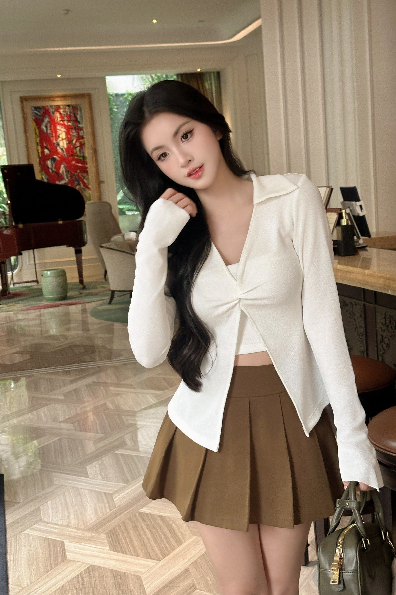 Chân váy xòe xếp ly dáng mini