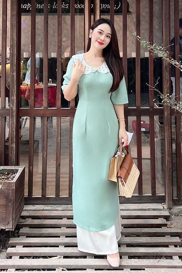 Áo dài ôm lụa xanh mint phối cổ ren trắng