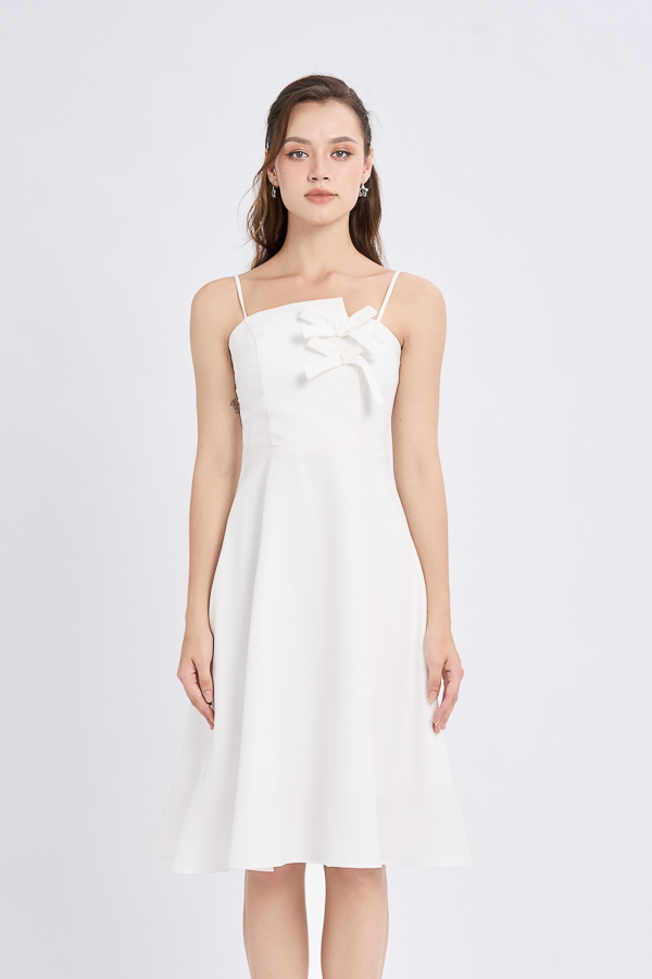 Đầm mini xòe bố len phối nơ trang trí lệch